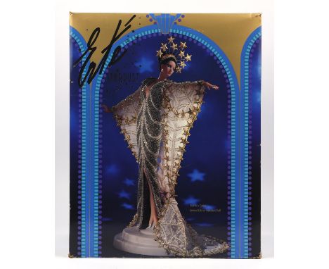 Erte Stardust Porcelain Doll. Limited edition model by Mattel the makers of Barbie. Complete and boxed. Reverse of box with l