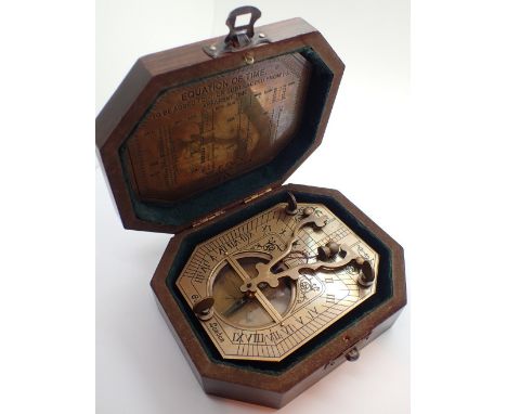 Boxed brass sundial compass marked Cox London
