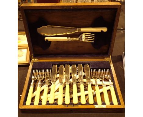 Wooden cased silver cutlery set by Butt and Co 