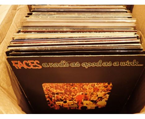 Approximately sixty 1970s Rock LPs including Faces Electric Light Orchestra Rolling Stones Lifetime Santana Focus Manfred Man