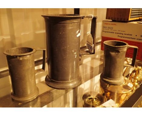 Three antique pewter gun powder measures probably continental two marked double decilitre