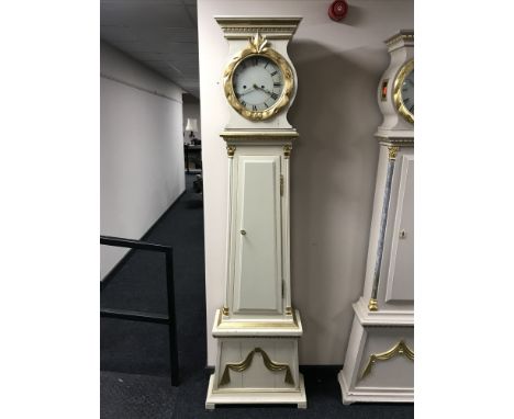 A painted long cased clock with enamelled dial 