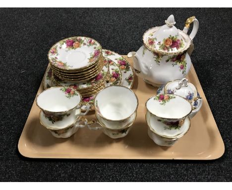 A tray of twenty one piece Royal Albert Country Roses tea set together with a Royal Albert Moonlight rose sugar basin