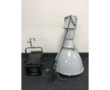 A large industrial halogen lamp and a disco light 