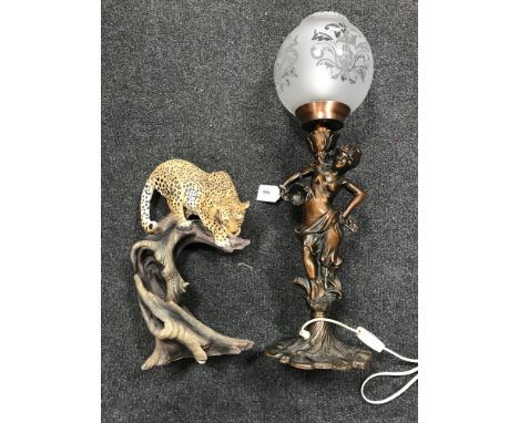 A bronzed table lamp - figure of a maiden and a figure of a leopard 