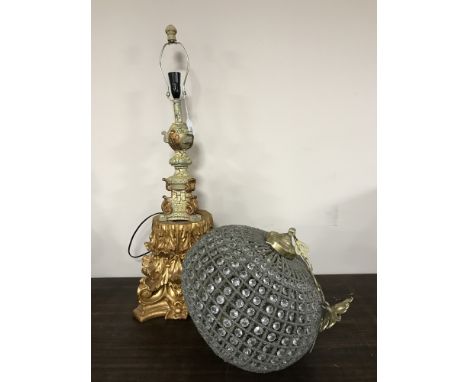 A contemporary cream and gilt lamp base together with a brass and glass ball chandelier  