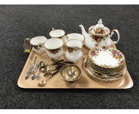 A tray of seventeen pieces of Royal Albert Old Country roses tea china together with two sets of teaspoons, sugar tongs and a