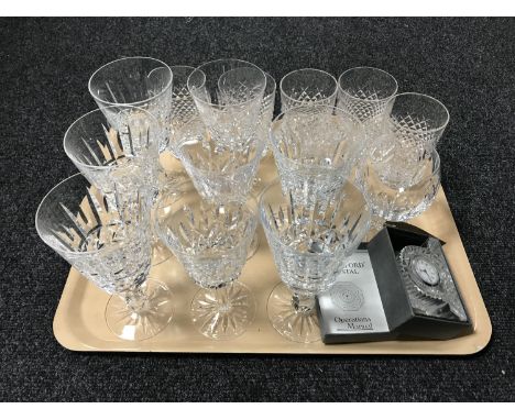 A tray of Waterford crystal glasses and a boxed Waterford desk clock.