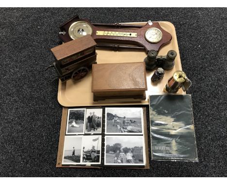 A tray of contemporary barometer, copper and brass miners lamp, field glasses, musical box in the form of an organ, monochrom