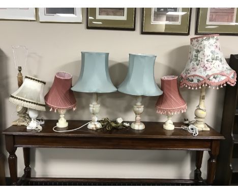 Three pairs of marble table lamps together with an odd marble lamp (7)