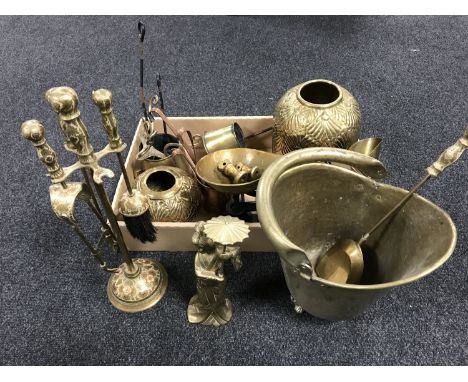 A box of brass including scales and weights, companion set, embossed vases, gavel etc.