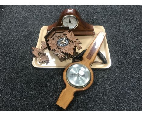 A tray of Black Forest style cuckoo clock with pendulum and weights, Acctim mantel clock together with a barometer