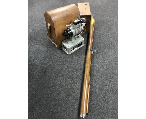 A 1940's vintage projector with screen, speaker and splicing machine