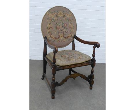 Tapestry needlework upholstered open armchair, with canework seat and wavy front stretcher, 61 x 106 x 47cm. 
