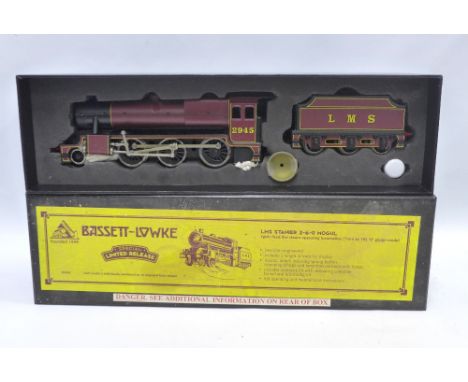 Bassett Lowke LMS 295 engine within the original box together with a small group of track for display purposes. 