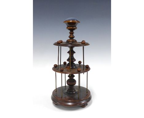 Victorian mahogany three tier bobbin stand, with blue velvet pin cushion finial, 35cm 