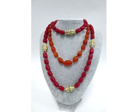 Two strands of vintage beads (2) 