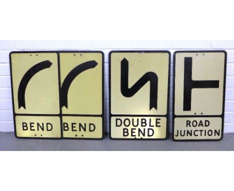 Four vintage reflective road signs, including a Winsser 'road junction', 'double bend' and two right hand 'bend' signs, large