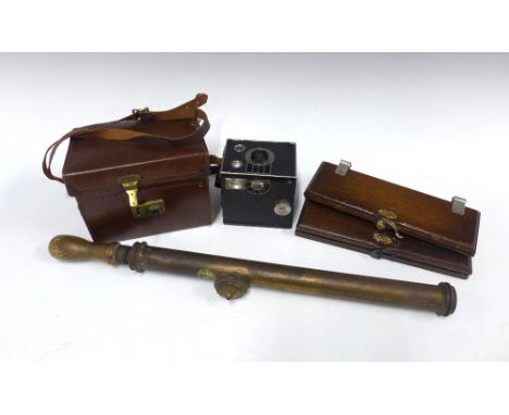 Vintage Brownie Senior camera in leather carry case, together with two Acme tie presses and a brass sprayer (4) 