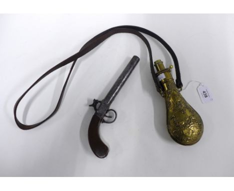 Antique percussion cap pistol and a brass powder flask (2) 