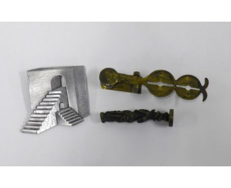 Pewter steps brooch, sovereign coin scales and a figural seal (3) 