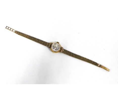 Ladies vintage 9ct gold Omega wristwatch on a 9ct gold textured bracelet strap, Sheffield 1973 