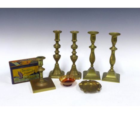 Two pairs of brass candlesticks, 25cm, together with a smaller candlestick, ashtray, brass dish and vintage Seidlitz Powders 