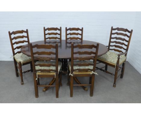 Ercol dining table and six chairs, 167 x 73 x 107cm. 