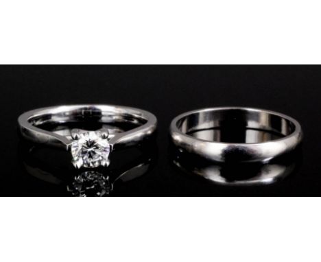 A modern platinum mounted diamond solitaire ring, the brilliant cut stone approximately .50ct (gross weight 4.8 grammes - rin