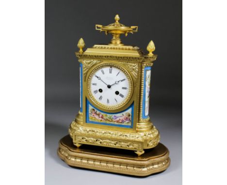 A 19th Century French ormolu and porcelain mounted mantel clock by J.B.D., No. 34056, retailed by Marshall, 25 Princess Stree