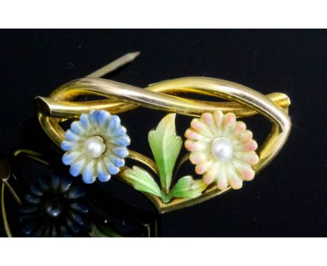 A late Victorian 15ct gold, enamel and seed pearl set double daisy flowerhead pattern brooch, the two flowers enamelled in bl