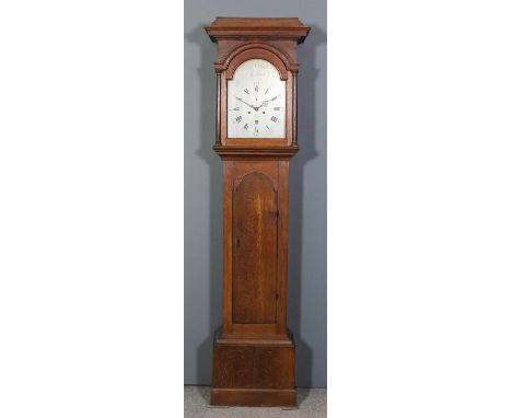 A late 18th/early 19th Century oak longcase clock by John Snatt of Ashford, the 12ins arched silvered dial with Roman and Ara