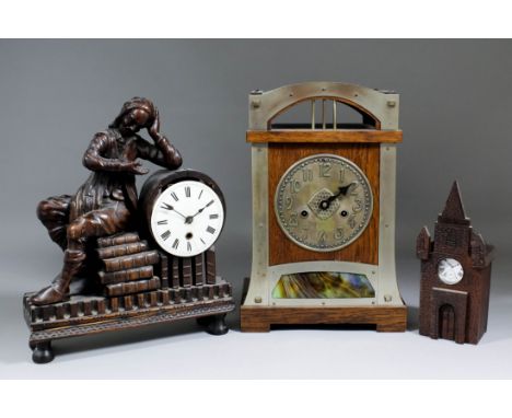 An early 19th Century carved limewood clock case modelled as a seated scholar astride a stack of books, on turned feet, 13.75