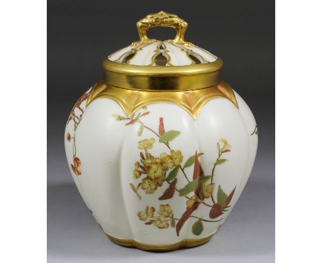 A late 19th Century Royal Worcester "Blush Ivory" porcelain pot pourri vase and pierced cover, enamelled in colours with loos