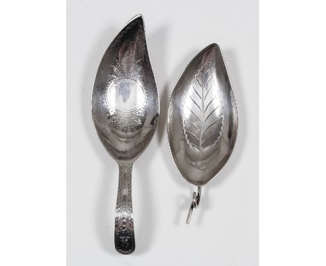 A George III silver caddy spoon, the leaf pattern bowl with wrigglework engraving of circular cartouche and with bright cut h