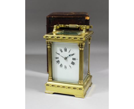 A late 19th/early 20th Century French carriage clock, the white enamelled dial with Roman numerals to the eight day two train