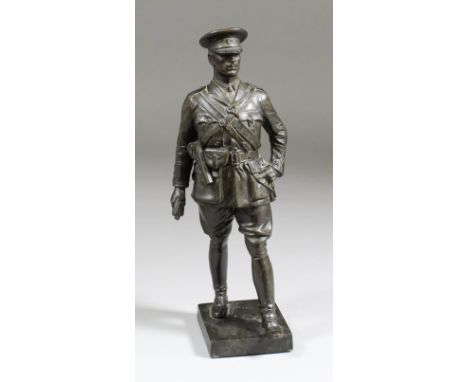 Early 20th Century bronze figure of a First World War officer holding a revolver, 9ins high (tip of revolver missing)