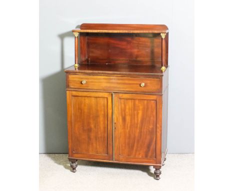 A George IV mahogany chiffonier fitted one open shelf, the back supported by Corinthian capped columns, fitted one frieze dra