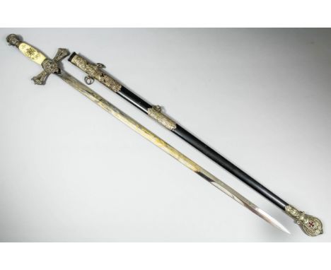 An M.C. Lilley & Co of Colombus, Ohio, Masonic sword, the 28ins blade insribed "Charles B. Hollemberry" and with knights in a
