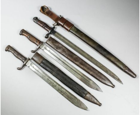 A First World War German bayonet by Fichtel and Sachs (second pattern 1916), the 14.5ins blade stamped with company name and 
