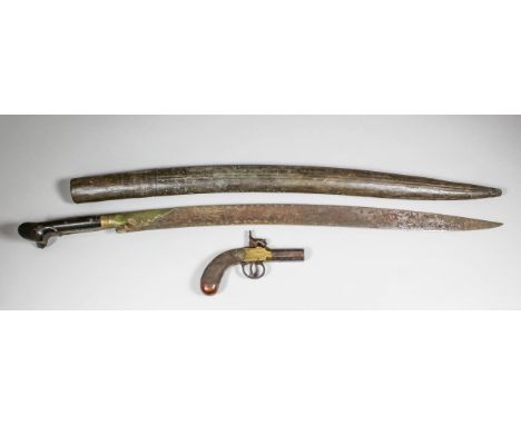 A 19th Century Continental percussion cap pocket pistol with 2ins octagonal steel barrel and brass framed action engraved wit