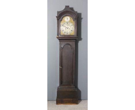 An 18th Century oak longcase clock by George Maynard of Melford, the 12ins arched brass dial with silvered chapter ring with 