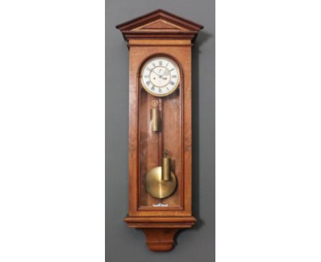 A late 19th Century walnut  cased "Vienna Regulator" by Gustave Becker, the 6.5ins white enamelled dial with Roman numerals a