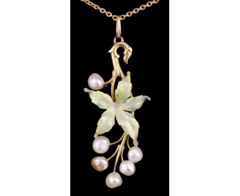 An early 20th Century French gold coloured metal pearl and green enamel mounted stylised leaf pattern pendant, set with six p