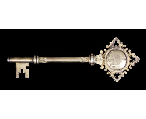 An Edward VII silver gilt presentation key to commemorate the Opening of Leigh Public Turkish Baths  with inscription to reve