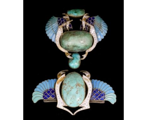 A late 19th Century silvery coloured metal mounted turquoise and enamel "Egyptian Revival" pattern brooch, the central oval n