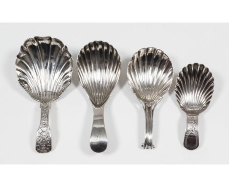A George IV silver caddy spoon with shell pattern bowl and fiddle pattern handle chased with floral and leaf ornament, London