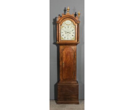 An early 19th Century oak longcase clock by Lepine of Canterbury, the 12ins arched painted dial with Roman and Arabic numeral