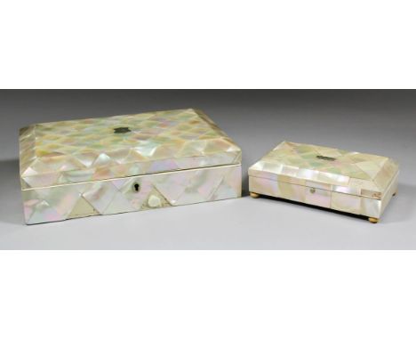 An early 20th Century mother of pearl rectangular games box, the fitted interior with cribbage board and two card boxes, 10.5