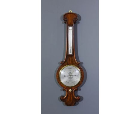 A victorian figured walnut cased barometer and thermometer by J. Good of London, with silvered dials, the barometer dial 8ins